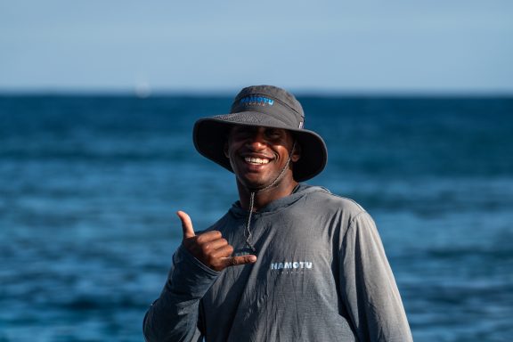 namotu boatmen fiji wearing patagonia uniform